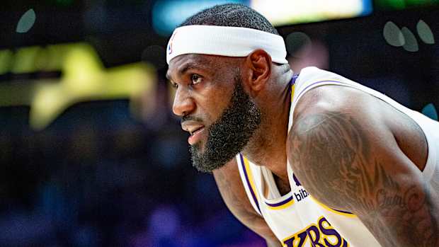 LeBron James bends over to catch his breath